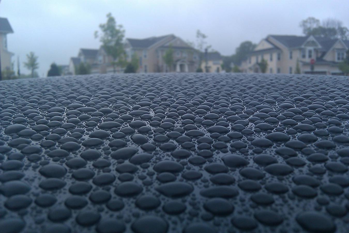 Surface tension - surface tension of water on top of a car