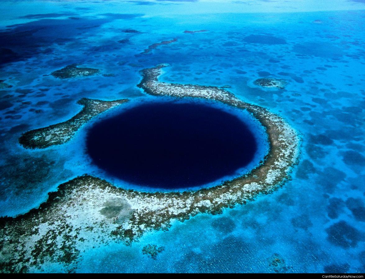 Black hole water - looks like a black hole in the water but its probably whats left of a volcano