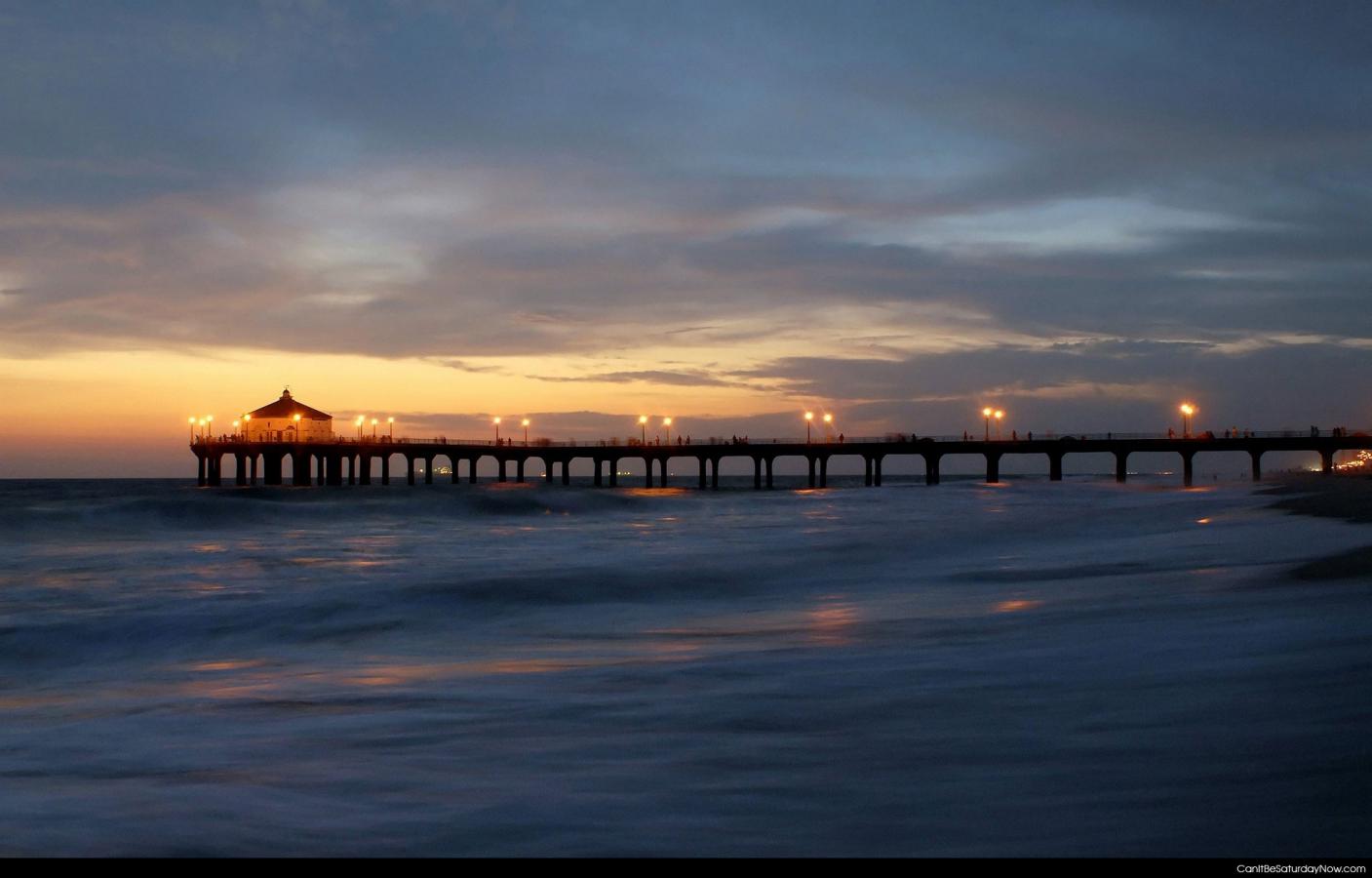 Sunset pier - a long pier at sunset