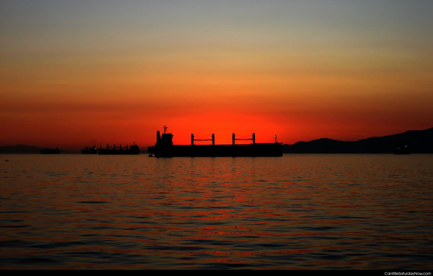 Tanker dawn - sunset over a tanker ship